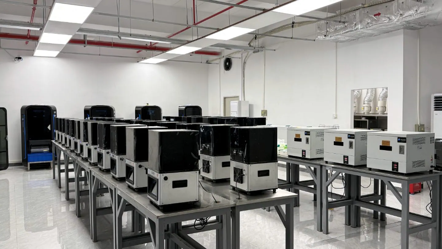 Rows of production equipment on the KC Dental Lab shop floor